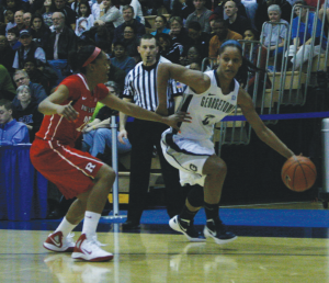 FILE PHOTO: CHRIS GRIVAS FOR THE HOYA Senior forward Tia Magee, shown against Rutgers, scored her 1,000th career point in the second half of the Hoyas’ game at Cincinnati. Magee scored 18 points in the win.