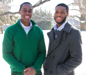  AMY LEE/THE HOYA Davis, left, has employed the help of fellow students such as Seun Oyewole (SFS '14), right, the campaign's technology director, in his bid to become Newark's West Ward city councilman. 
