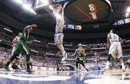 WEB LESLIE/THE HOYA Sophomore forward Nate Lubick throws down a dunk in the second half of the Hoyas' 75-45 win over USF Saturday morning.