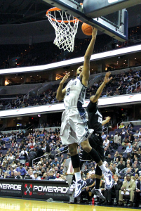 FILE PHOTO: CHRIS GRIVAS/THE HOYA Sophomore center Mikael Hopkins will have his hands full in the paint Saturday as he matches up against standout Cardinal Gorgui Dieng.