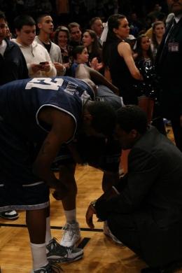 Image Contributor Junior guard Chris Wright is consoled by sophomore guard Jason Clark following Georgetown's 60-58 loss to West Virginia.