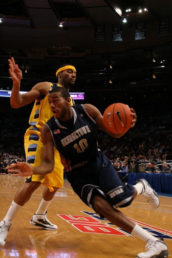 Sophomore center Greg Monroe led Georgetown with 23 points, 13 rebounds, seven assists and two blocks in an 80-57 rout of Marquette in the semifinals of the Big East tournament. The Hoyas face West Virginia on Saturday in the championship.