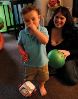 MEAGAN KELLY/THE HOYA Staci Webb (COL ’12) and her son Connor play in their university townhouse. Student mothers often struggle to balance school with their unique responsibilities.