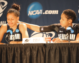 McNutt consoles Magee after GU's final loss to UConn.