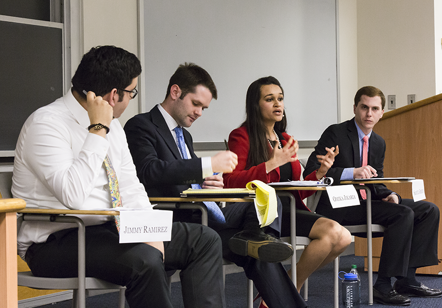 ALEXANDER BROWN/THE HOYA Left to right: Jimmy Ramirez (COL '15), Dan Silkman (COL '15), Omika Jikaria (SFS '15), Sam Greco (SFS '15)