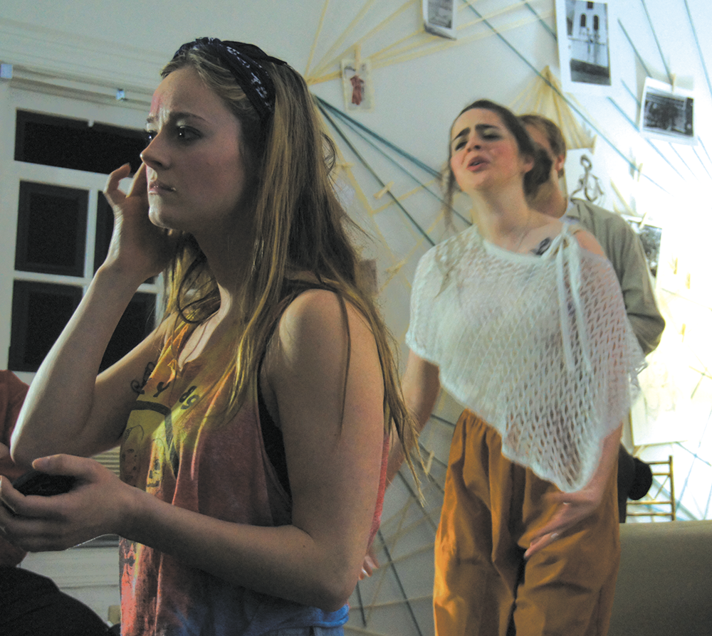 CLAIRE SOISSON/THE HOYA Shannon Walsh (Col ’15), left, and Amanda Weise (Col ’16), right, take on challenging and provoking roles in Nomadic Theatre’s latest production, which is taking place in a townhouse on 37th Street. 