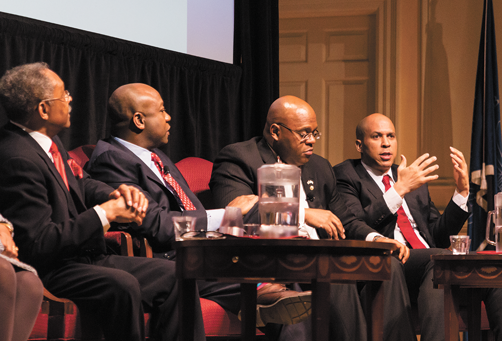 SOFIA LAYANTO FOR THE HOYA Left to right: Roland Burris (D-Ill.), Tim Scott (R-S.C.), Mo Cowan (D-Mass.) and Cory Booker (D-N.J.) reflect on the role that black senators have played in Congress.