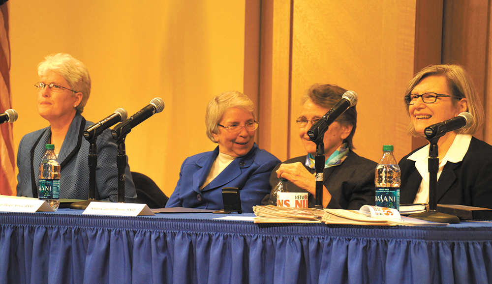 CLAIRE SOISSON/THE HOYA From left: Sisters Mary Johnson, Helen Amos, Camilla Burns and Simone Campbell lead a panel discussion Friday on the ways Vatican II changed the Catholic Church.