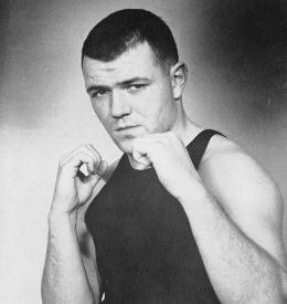 YE DOMESDAY BOOKE Tom Quinn (CAS ’55), Georgetown’s last boxing champion, in his senior- year yearbook. The Marine, boxer and actor died Jan. 5 at 79.