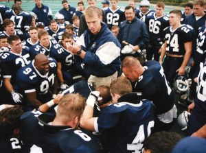 COURTESY GEORGETOWN UNIVERSITY ARCHIVES Coach Bob Benson with the team in 1997.
