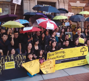 TOBY HUNG FOR THE HOYA Protesters supporting Hong Kong demonstrators rallied outside the Hong Kong Economic and Trade Office on Wednesday.