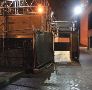 DANIEL SMITH/THE HOYA The winding, makeshift pathway set up during Northeast Triangle construction is poorly lit, leading to safety concerns from students. 