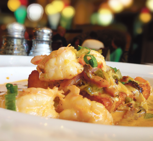 YIWEN HU/THE HOYA Acadiana offers fresh, exceptional versions of classic Louisianan dishes like this delicious plate of southern shrimp and grits.