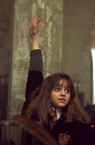 hermione-rasing-her-hand-harry-potter-movies-16644488-1383-2100