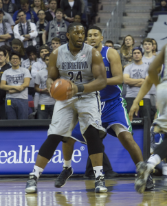 ISABEL BINAMIRA/THE HOYA Freshman forward L.J. Peak (top left) scored 10 points Tuesday against Texas A&M-Corpus Christi. Senior center Josh Smith (right) scored 20 points and had 12 rebounds. Senior forward Aaron Bowen scored 13.