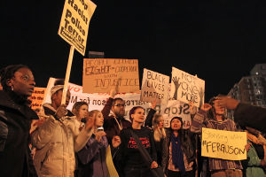 CHARLIE LOWE/THE HOYA Students joined protests last night that started in Chinatown.