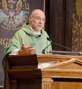 DAN GANNON/THE HOYA Fr. Daniel Madigan, S.J., spoke at Jesuit Heritage Week’s opening event.