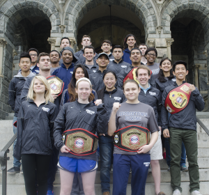 DAN GANNON/THE HOYA Three members of the Georgetown University Club Boxing team earned individual title belts at the USIBA National Championships, including sophomores Sinead Schenk and Corinna Di Pirro, pictured at the bottom of the steps.