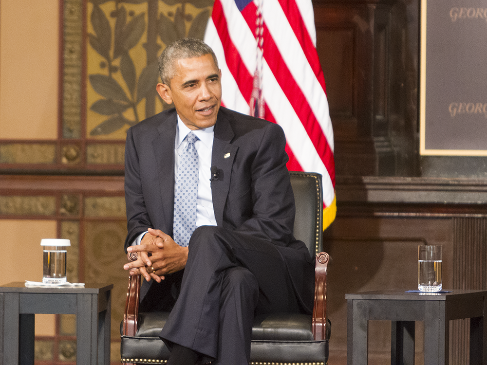 CHRIS GRIVAS/THE HOYA President Barack Obama discussed the cost of poverty in Gaston Hall on Tuesday.