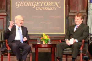 FILE PHOTO: CHRIS GRIVAS/THE HOYA The Bank of America, whose CEO Brian Moynihan is pictured here with Warren Buffet in a discussion in Gaston Hall in 2013, donated $1 million to the Georgetown Global Social Enterprise and the Georgetown Institute for Women, Peace and Security last week.
