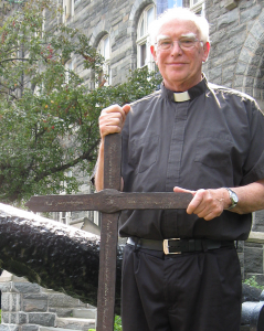 COURTESY FR. PAT ROGERS, S.J. The Dahlgren Chapel cross, which was discovered in a storage space in Healy Hall by Fr. G. Ronald Murphy, S.J. (pictured) in 1989, will be featured at Pope Francis’ first mass next Wednesday.
