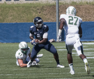 FILE PHOTO: ISABEL BINAMIRA/THE HOYA Junior wide receiver Justin Hill had four receptions for 118 yards and two touchdowns, including an 80-yard touchdown reception, in the Hoyas’ 24-16 win over Columbia. Hill has 292 yards this season.