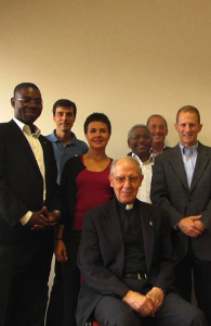 TWITTER Rev. François Kabore, S.J., far left, and Fr. Matthew Carnes, S.J., far right, travelled to Rome two weeks ago as part of a Jesuit task force.