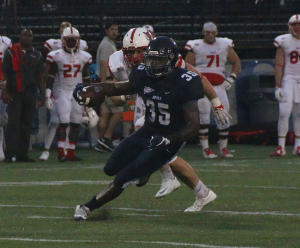 FILE PHOTO: ISABEL BINAMIRA/THE HOYA Senior running back Jo’el Kimpela rushed for a season-high 142 yards and one touchdown on 18 carries in Georgetown’s win over Bucknell.