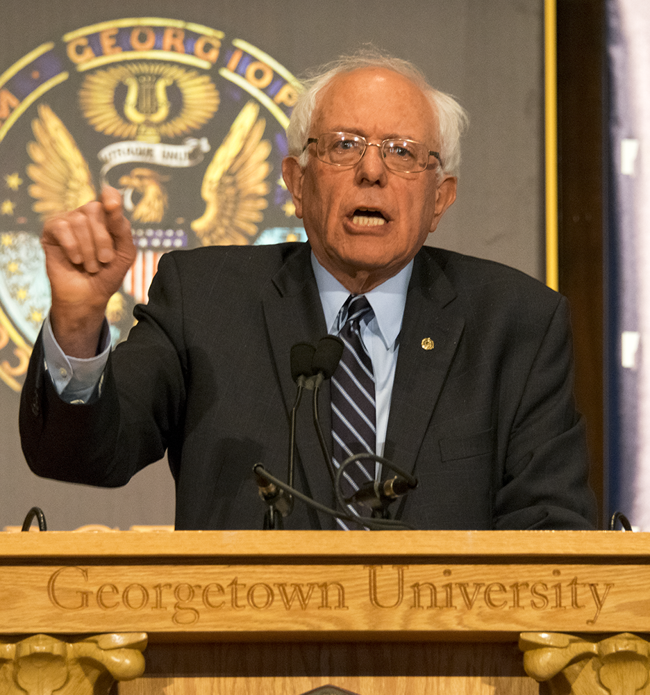 ROBERT CORTES/THE HOYA Sen. Bernie Sanders (I-Vt.), a Democratic presidential candidate, addressed a Gaston Hall audience that could not accommodate all who started lining up before 6 a.m. Thursday.