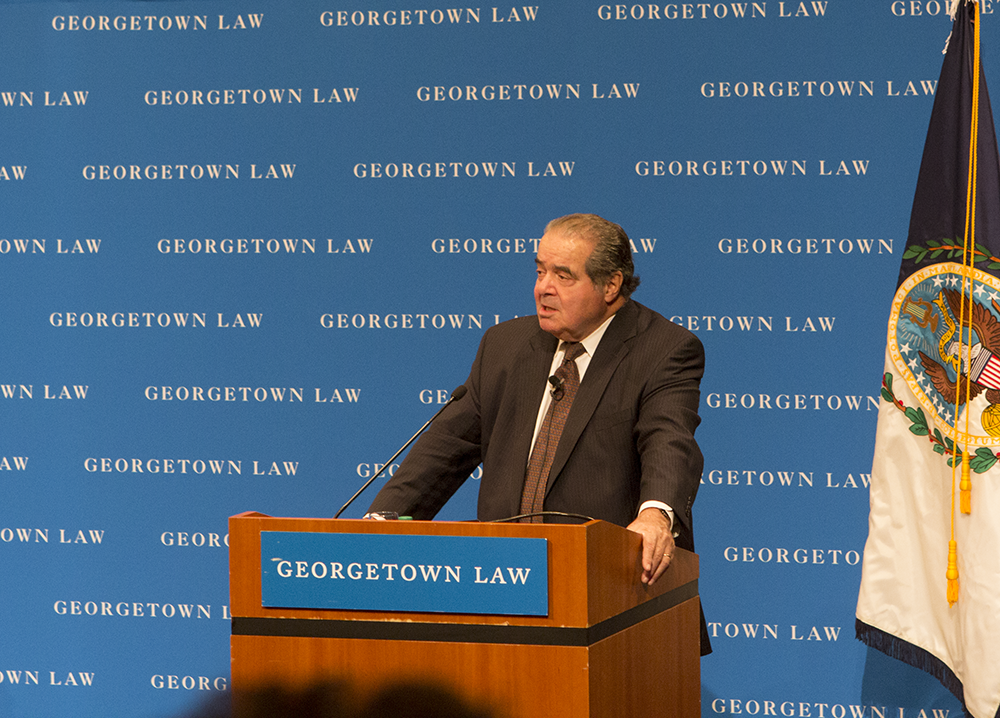 CAROLINE KENNEALLY FOR THE HOYA Supreme Court Justice Antonin Scalia (CAS ’57) delivered a guest lecture for 360 first-year law students in the Hart Auditorium at the Georgetown University Law Center’s McDonough Hall on Monday. He discussed his career, infamous dissents and originalist viewpoints. 