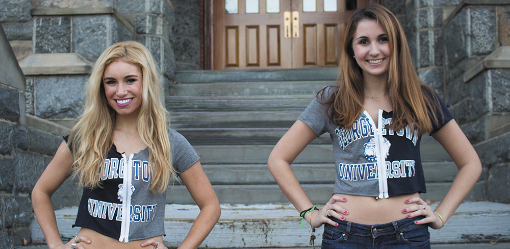 STEPHANIE YUAN FOR THE HOYA Julia Greenzaid (COL ’17), left, and Laura Fawzi (MSB ’17) started their own business of selling customized T-shirts embroidered with daisies and zippers. The company has expanded to create merchandise for many colleges across the country such as Auburn and Michigan State University.