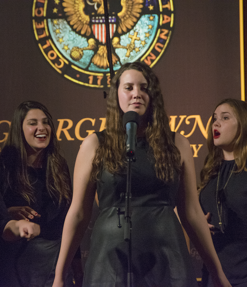  JINWOO CHONG/THE HOYA Tori Forelli (COL ’18) performs with the Gracenotes, who closed the show in Gaston Hall last Saturday with a five-song set.