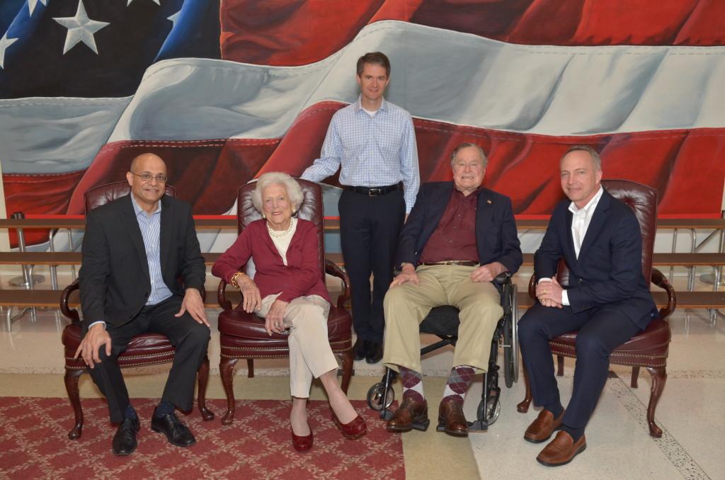 COURTESY MSB WEBSITE Georgetown professors, Michael O'Leary, Paul Almeida and Brooks Holtom who work for the Presidential Leadership scholar program pose with George H. W. Bush and Barbara Bush at the George H. W. Bush Presidential Center. 