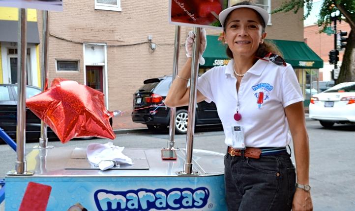 COURTESY MARACAS Julia Padierna-Peralta (SFS '87) stands with a tricycle-cart for her startup Maracas. The company is approaching its two year anniversary next week. 